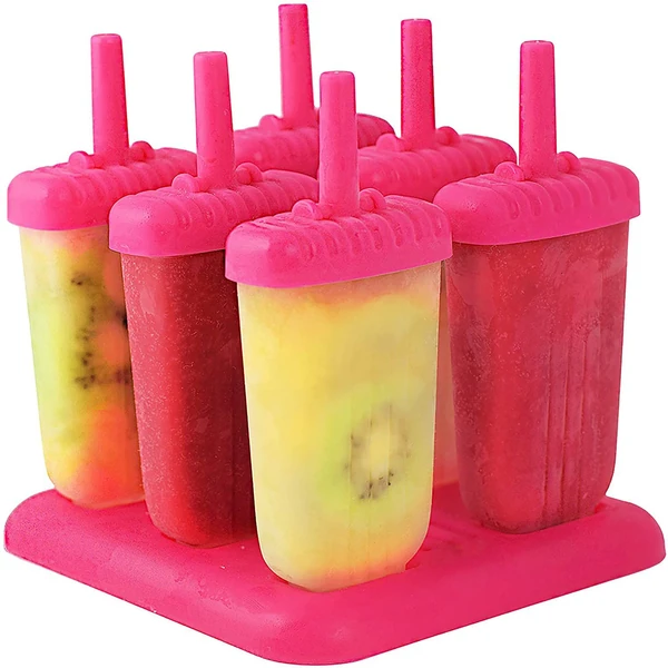 Six colorful homemade fruit popsicles in pink molds on a pink holder.