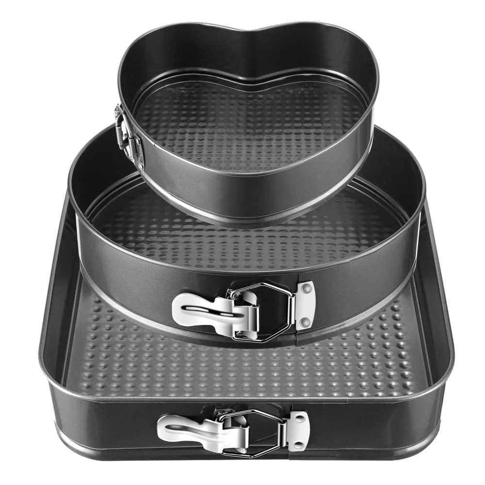 Set of three nonstick springform cake pans in heart, round, and square shapes.