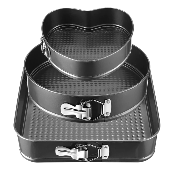 Set of three nonstick springform cake pans in heart, round, and square shapes.