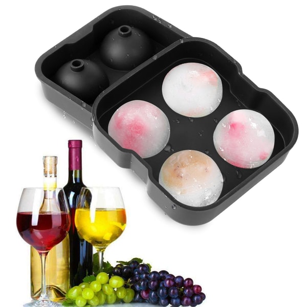 Spherical ice mold tray with wine glasses and grapes