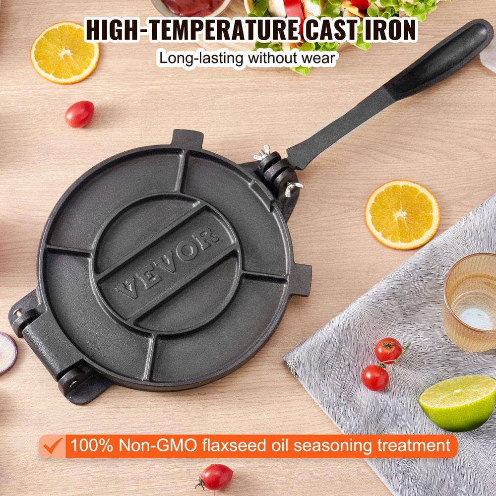 High-temperature cast iron press with non-GMO flaxseed oil seasoning treatment, surrounded by fresh produce.