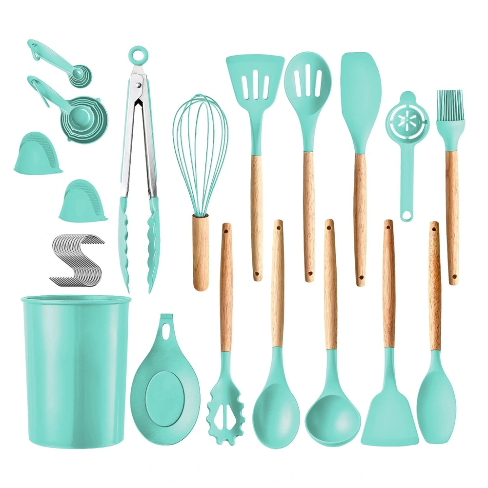 Teal silicone kitchen utensil set with wooden handles including measuring spoons, whisks, spatulas, tongs, and storage container.