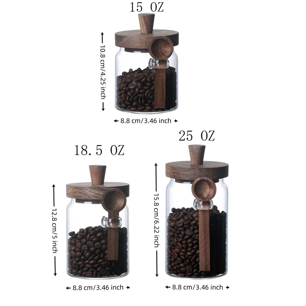 Three glass jars of different sizes filled with coffee beans, each with wooden lids and scoops attached.