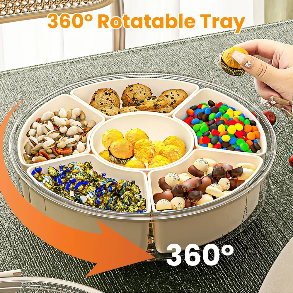 Rotatable 360-degree tray filled with assorted snacks and a hand picking a cracker